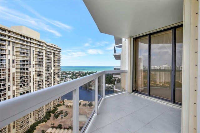 balcony featuring a water view