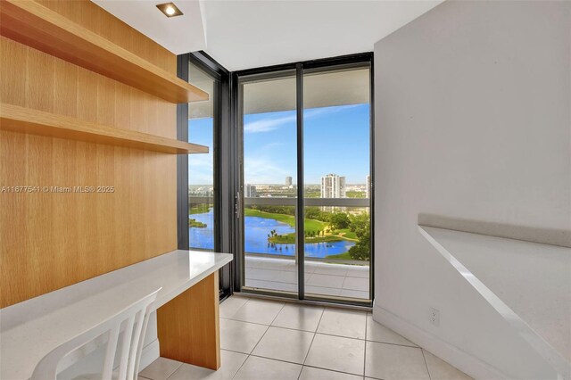 20185 E Country Club Dr Unit 2209, Aventura, FL 33180 - doorway featuring expansive windows and light tile patterned floors