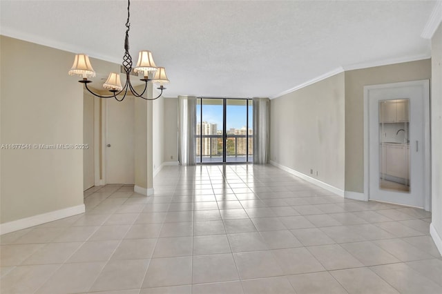 20185 E Country Club Dr Unit 2209, Aventura, FL 33180 - spare room with crown molding, a chandelier, a textured ceiling, baseboards, and expansive windows