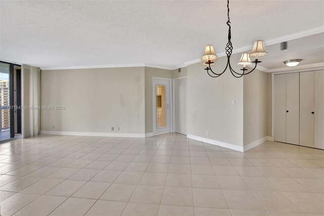 20185 E Country Club Dr Unit 2209, Aventura, FL 33180 - empty room with a chandelier, crown molding, baseboards, a textured ceiling, and light tile patterned floors