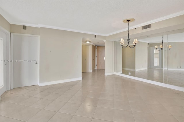 20185 E Country Club Dr Unit 2209, Aventura, FL 33180 - empty room with a chandelier, ornamental molding, a textured ceiling, baseboards, and light tile patterned floors
