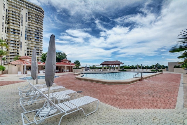 20185 E Country Club Dr Unit 2209, Aventura, FL 33180 - community pool featuring a gazebo and a patio area