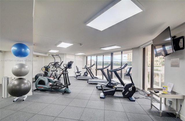 workout area with a wall of windows