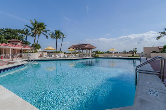 20185 E Country Club Dr Unit 2209, Aventura, FL 33180 - community pool featuring a patio area