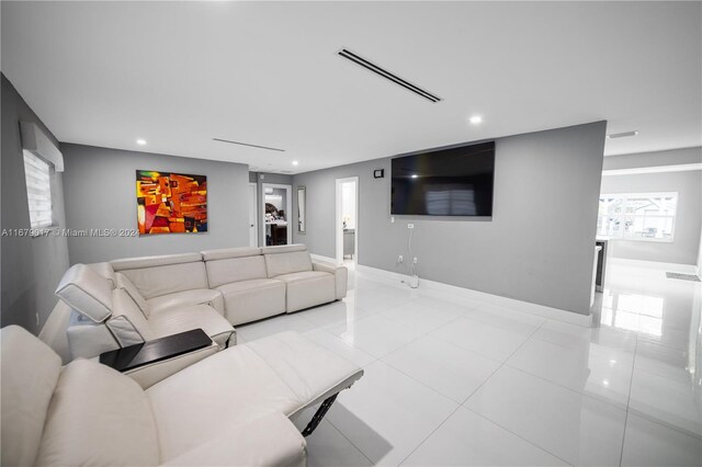 13550 SW 99th Pl, Miami, FL 33176 - living room featuring recessed lighting, baseboards, and light tile patterned floors
