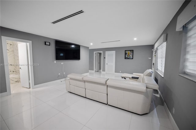 living room featuring light tile patterned flooring