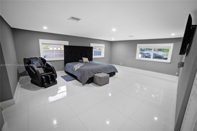 13550 SW 99th Pl, Miami, FL 33176 - tiled bedroom with baseboards, multiple windows, and recessed lighting