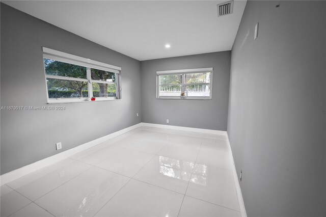 13550 SW 99th Pl, Miami, FL 33176 - unfurnished room featuring baseboards and tile patterned floors