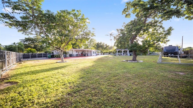 view of yard with a pergola