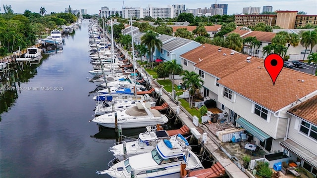 bird's eye view with a water view and a city view