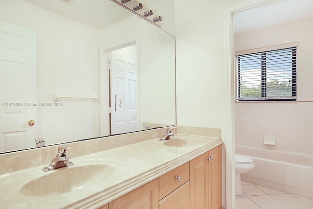 bathroom featuring vanity, toilet, and tile patterned floors