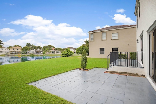 view of patio / terrace with a water view