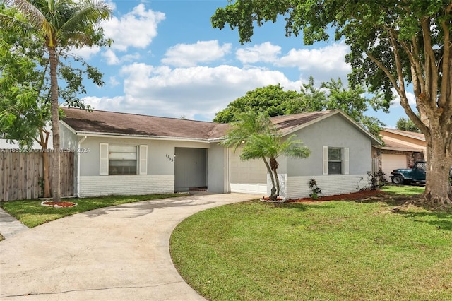 ranch-style house with a front yard and a garage