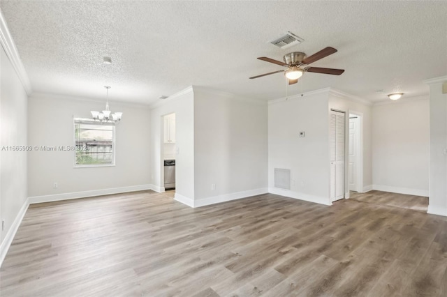 unfurnished living room featuring crown molding, a textured ceiling, and wood-type flooring