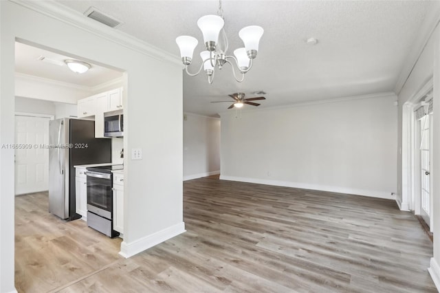 kitchen featuring appliances with stainless steel finishes, light hardwood / wood-style flooring, white cabinets, and ceiling fan with notable chandelier