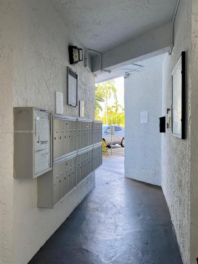 view of property's community with mail boxes