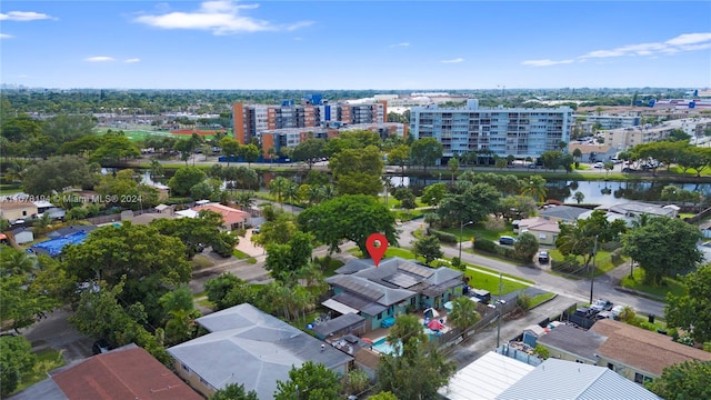 birds eye view of property featuring a water view