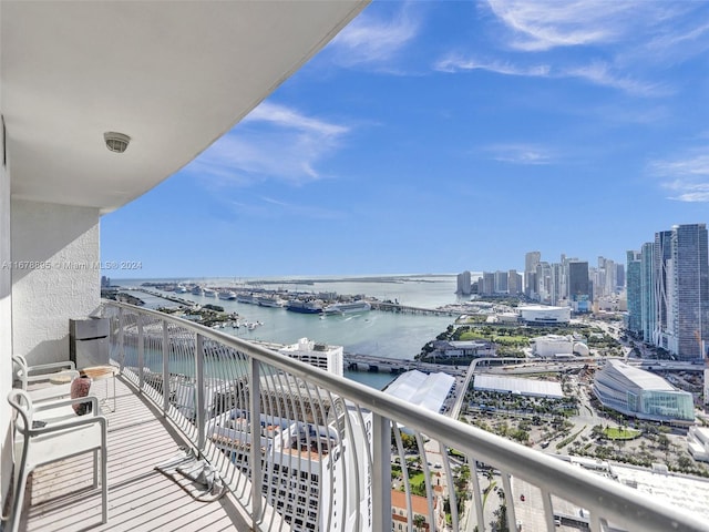 balcony featuring a water view