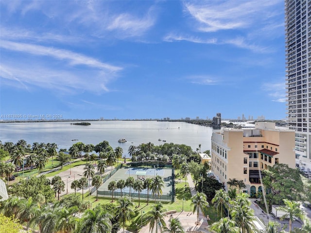 birds eye view of property with a water view