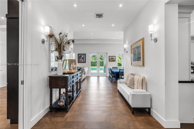 hall featuring french doors and hardwood / wood-style flooring