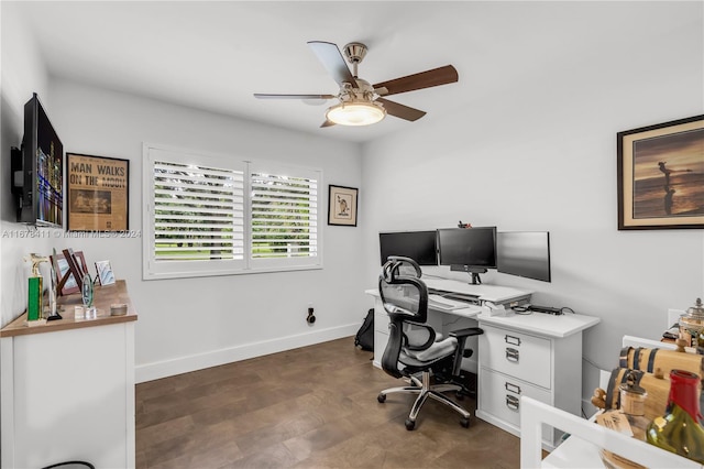 office with dark wood-type flooring and ceiling fan