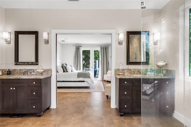 bathroom with vanity and french doors