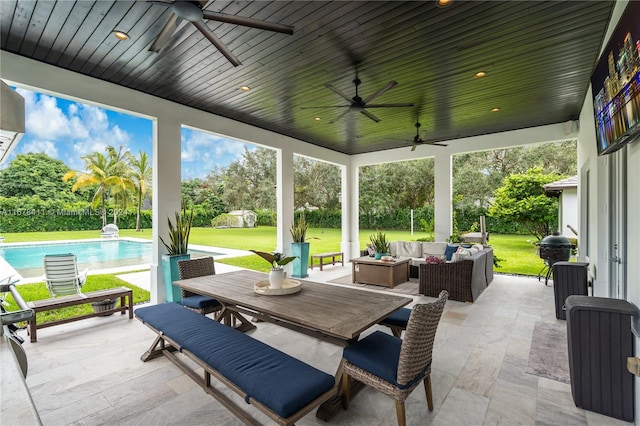 view of patio / terrace with ceiling fan and outdoor lounge area