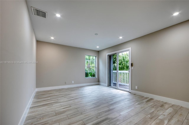 empty room with light wood-type flooring