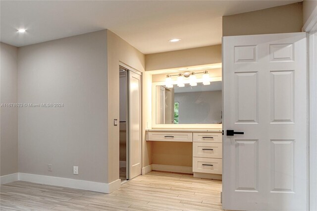 115 Ocean Dunes Cir, Jupiter, FL 33477 - bathroom featuring wood finished floors, baseboards, recessed lighting, and vanity
