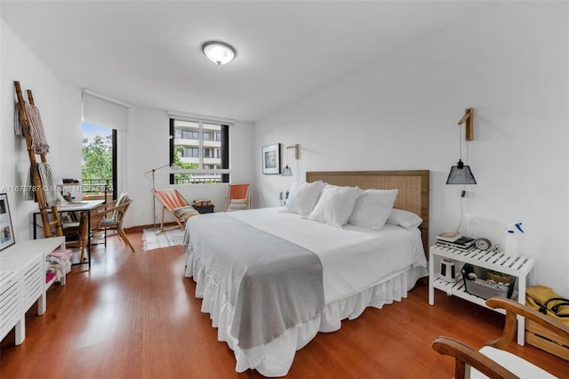 bedroom featuring hardwood / wood-style floors