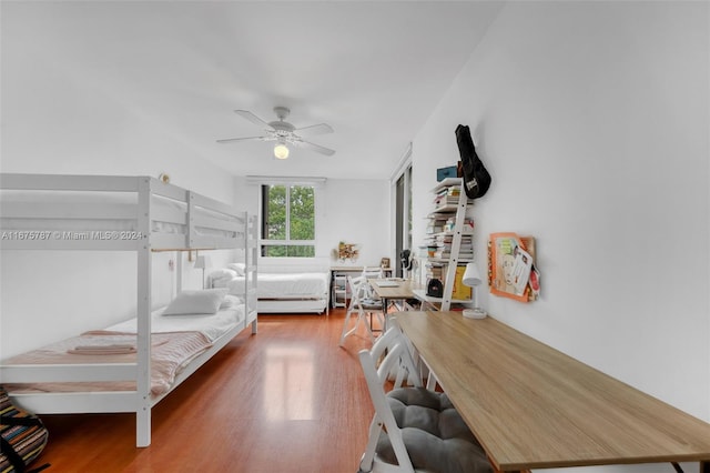 bedroom featuring ceiling fan and wood-type flooring