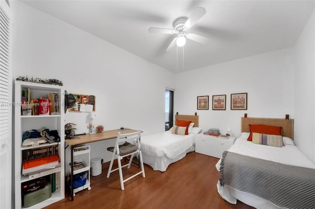 bedroom featuring hardwood / wood-style floors and ceiling fan