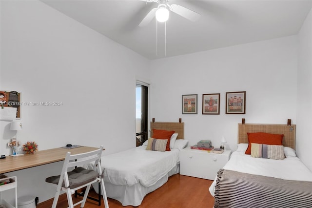 bedroom featuring hardwood / wood-style flooring and ceiling fan