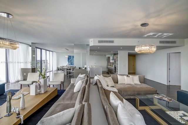 living room with a notable chandelier