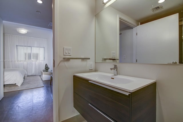 9940 W Bay Harbor Dr Unit 7G-N, Bay Harbor Islands, FL 33154 - bathroom featuring vanity, connected bathroom, and recessed lighting