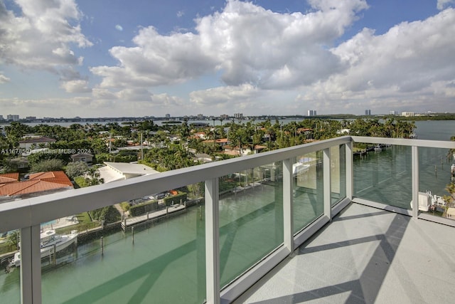 balcony featuring a water view