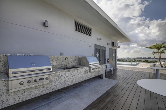 9940 W Bay Harbor Dr Unit 7G-N, Bay Harbor Islands, FL 33154 - wooden terrace featuring area for grilling and a sink