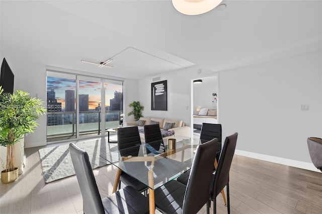 dining room with hardwood / wood-style floors