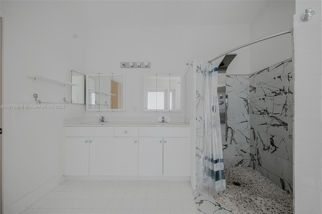 bathroom with vanity and walk in shower