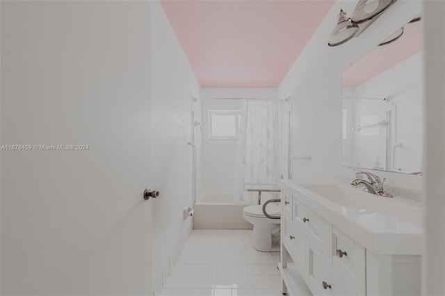 full bathroom featuring vanity, toilet, shower / bath combo with shower curtain, and tile patterned flooring