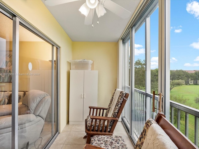 sunroom with ceiling fan and a wealth of natural light