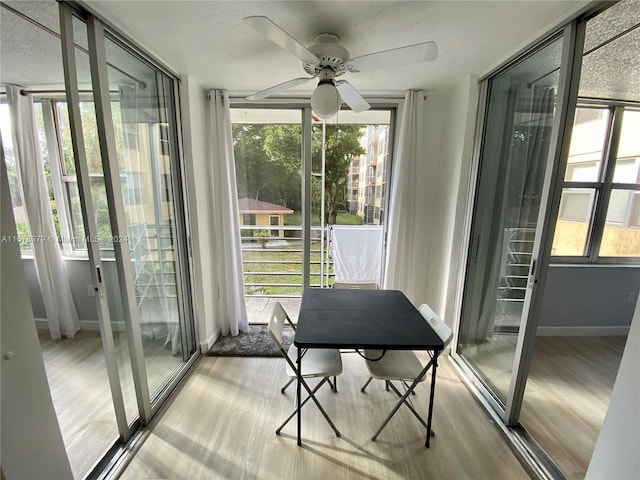 interior space featuring ceiling fan