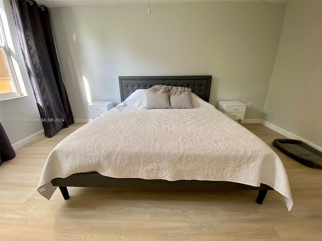 bedroom featuring light hardwood / wood-style flooring