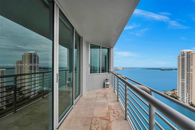 balcony featuring a water view