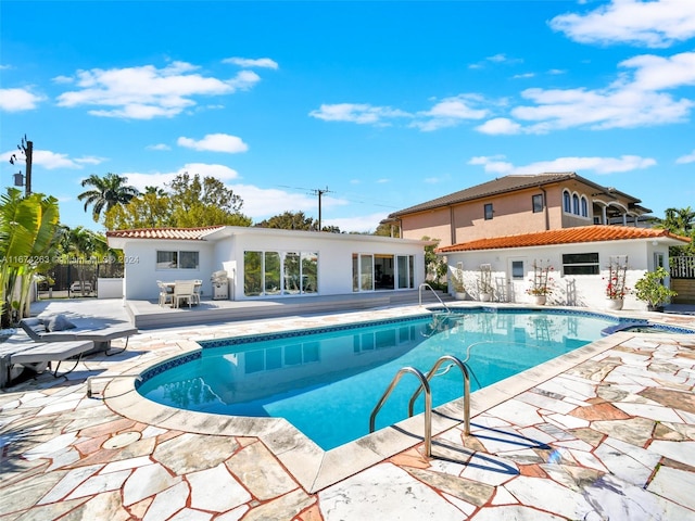 view of pool with a patio area