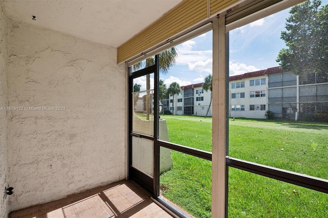 unfurnished sunroom with a healthy amount of sunlight