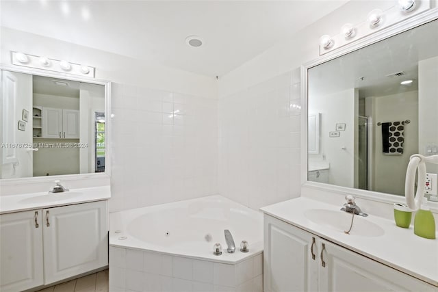 bathroom featuring vanity, separate shower and tub, and tile patterned flooring