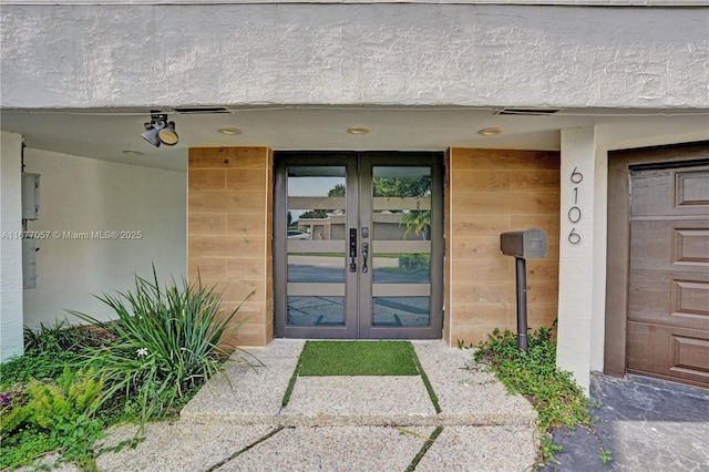 view of exterior entry with french doors