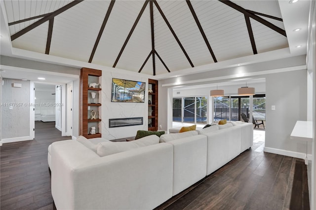 living room featuring dark wood-type flooring, beam ceiling, high vaulted ceiling, and a fireplace