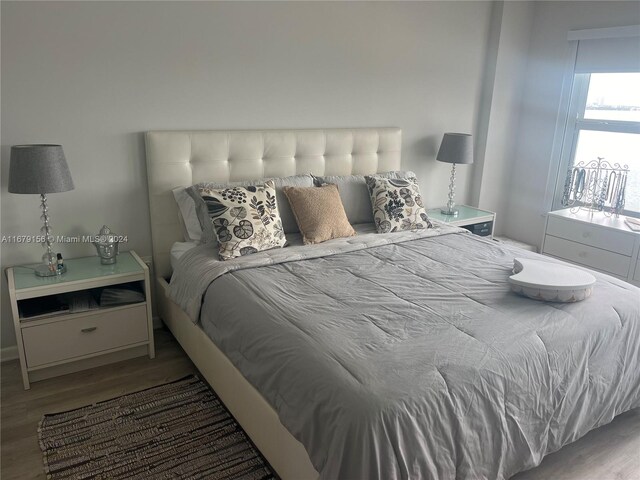 bedroom featuring hardwood / wood-style floors